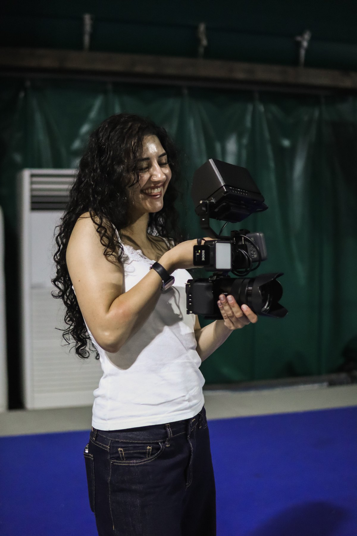 An ARTO camera operator filming on site