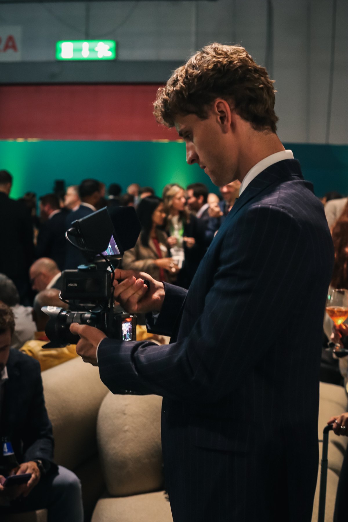 Sam filming at CPHI Milan